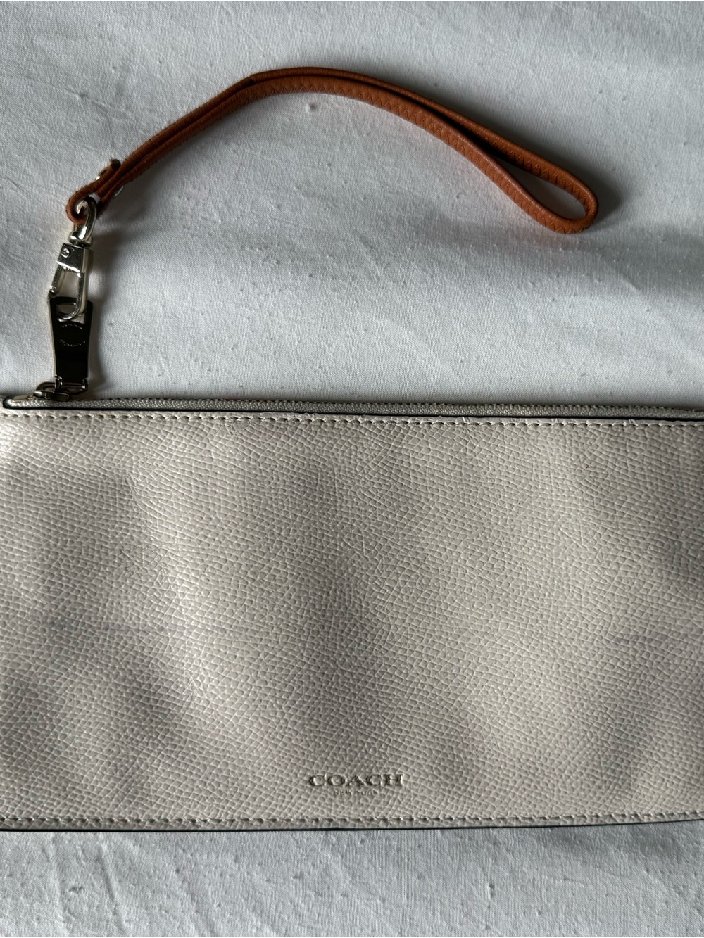 COACH Pebble Leather Wristlet in Light Gray with Tan Strap